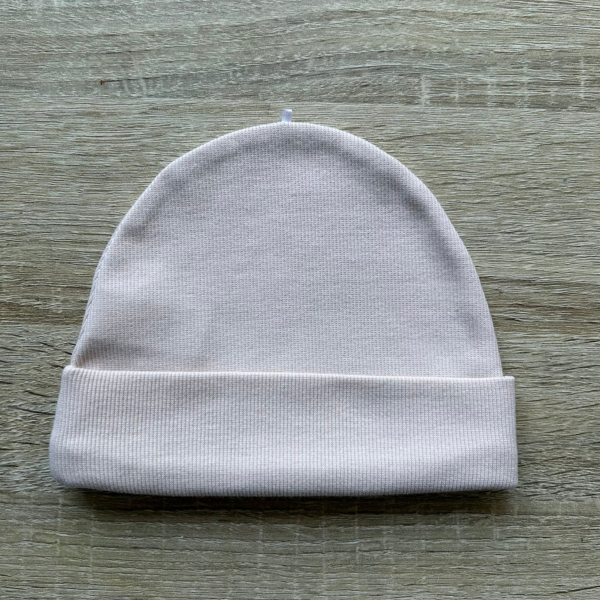 Baby Haube in Creme mit Namensstickerei
